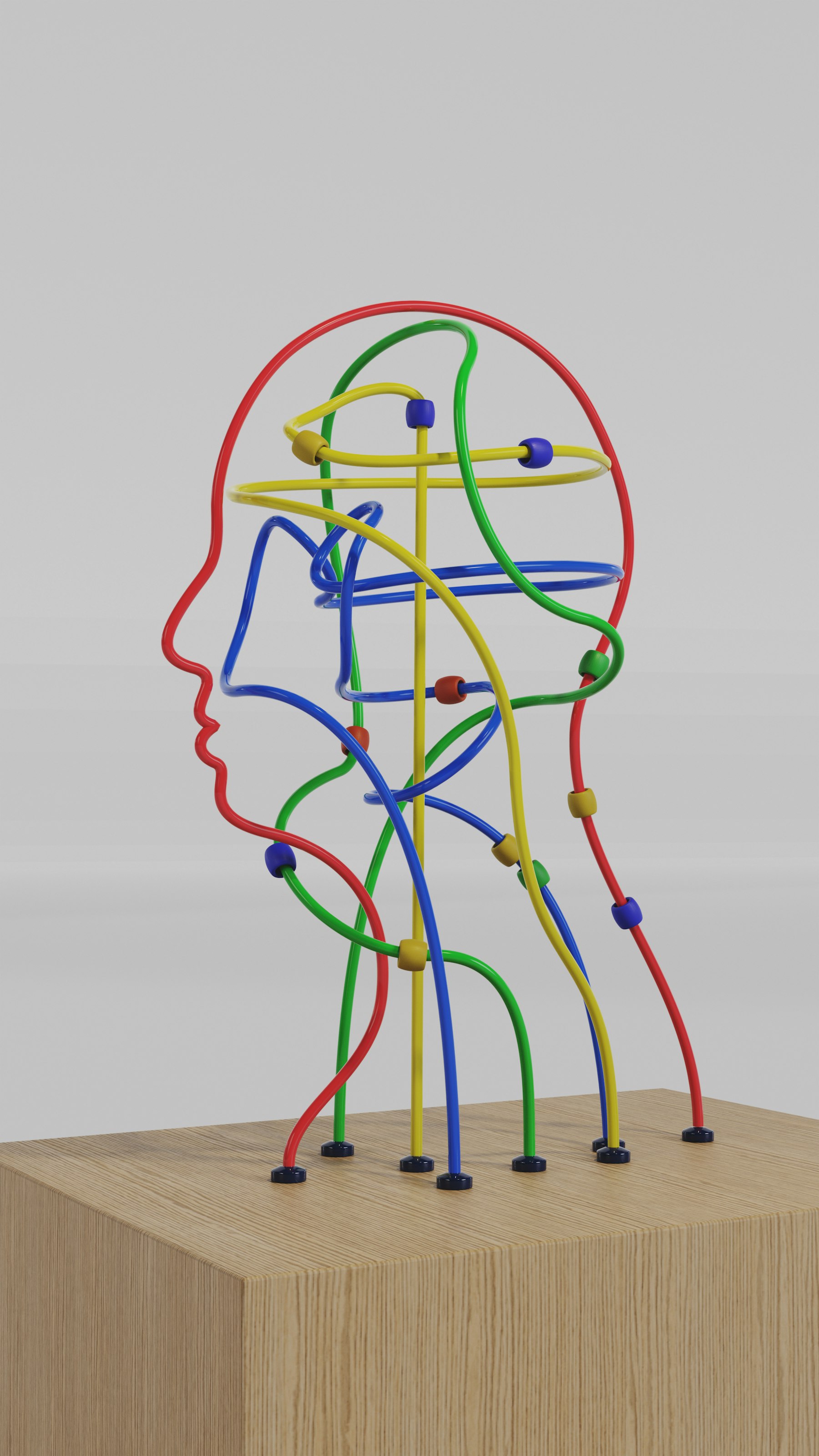 A sculpture of a human head made of colourful wires